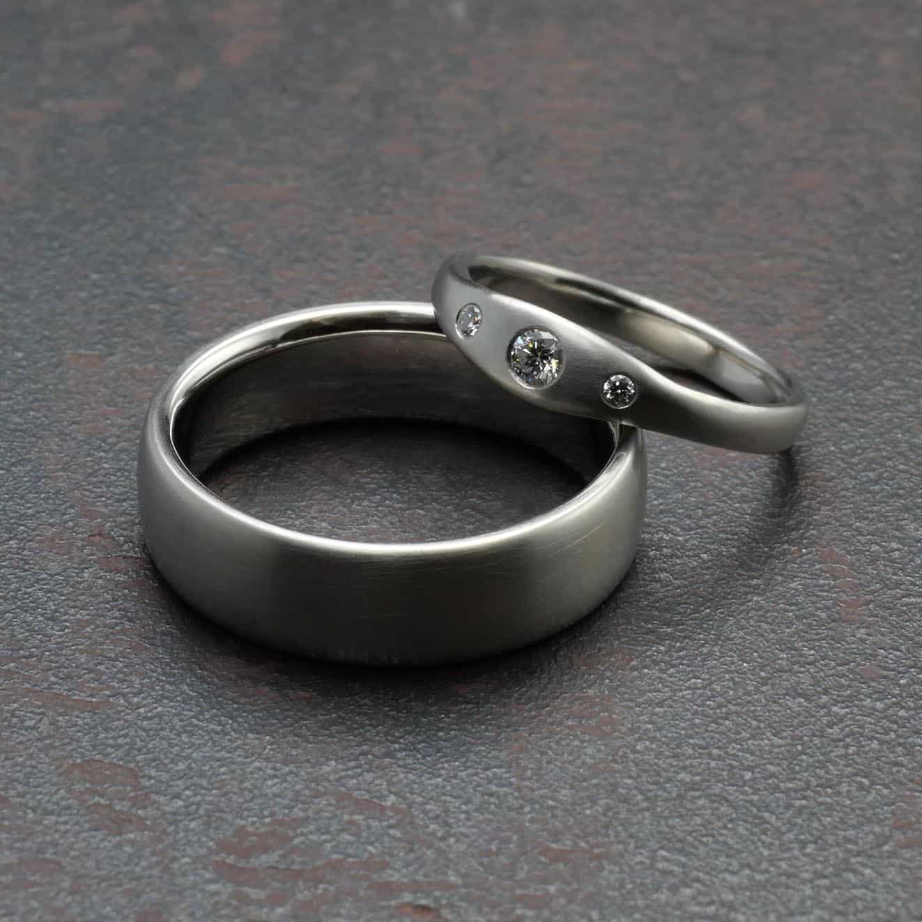 Platinum wedding rings, matt ladies' ring with diamonds