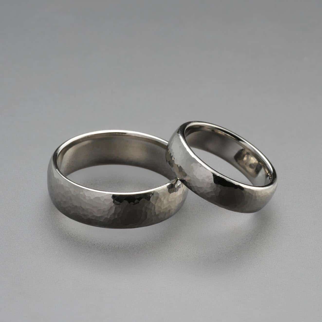Platinum wedding rings highly polished with hammer finish